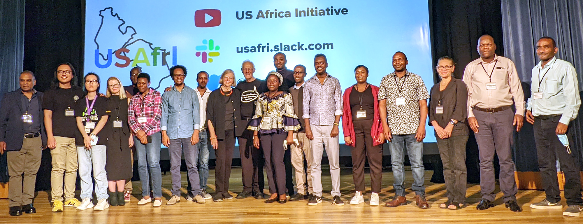 2022 Electronic Structure Workshop Group Photo of Visiting Researchers on Stage with USAfrI Organizers